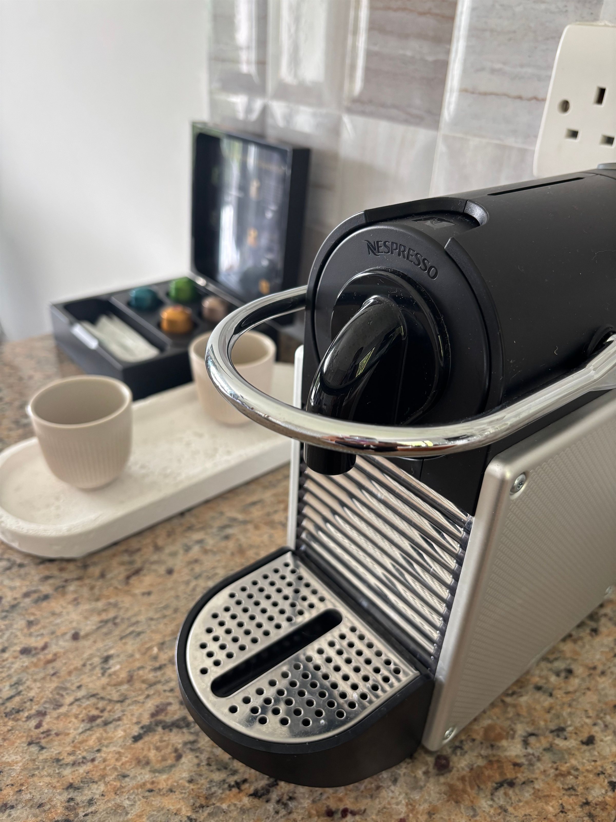 Nespresso machine and cups
