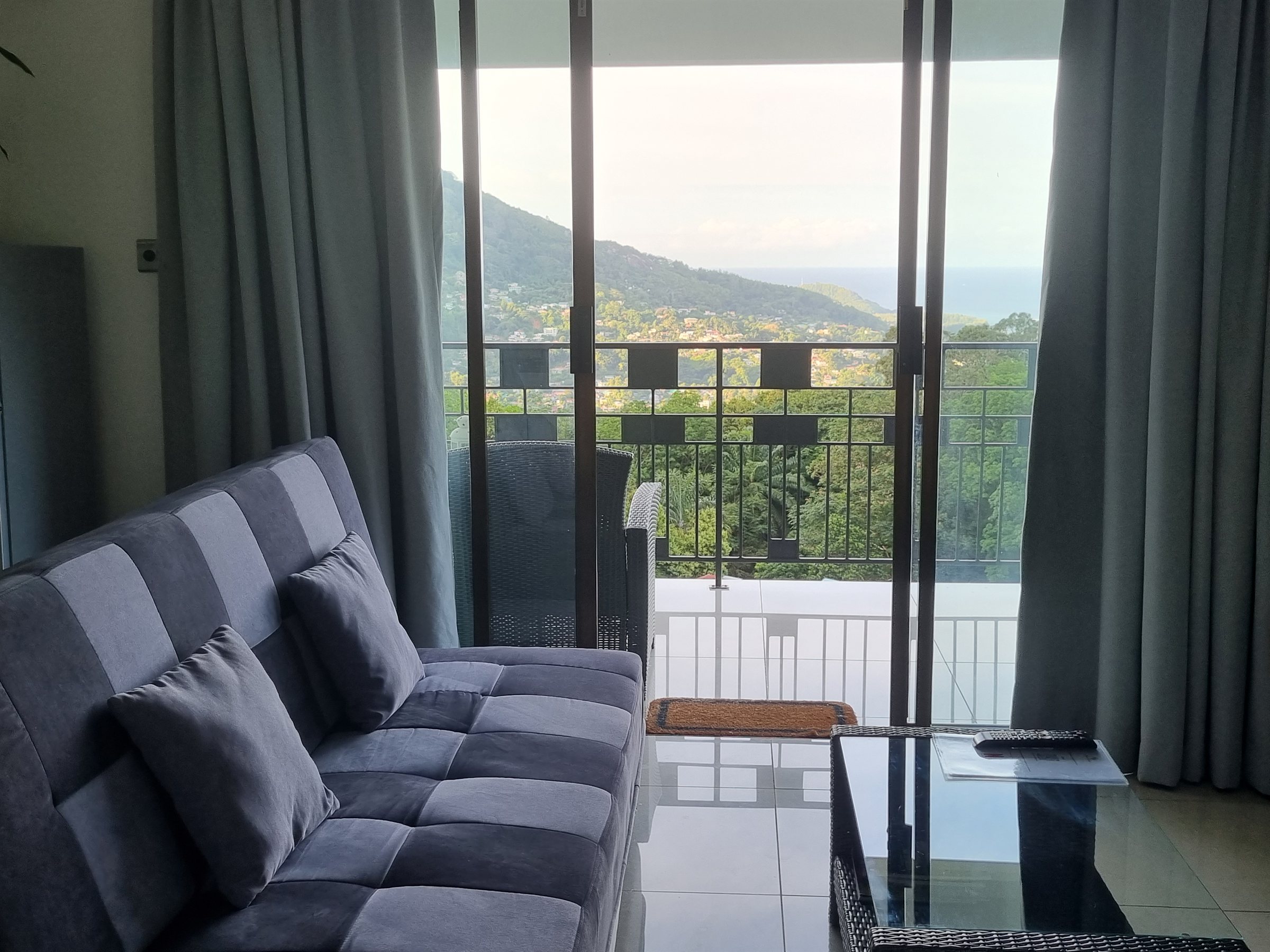 Lounge with mountain and ocean view